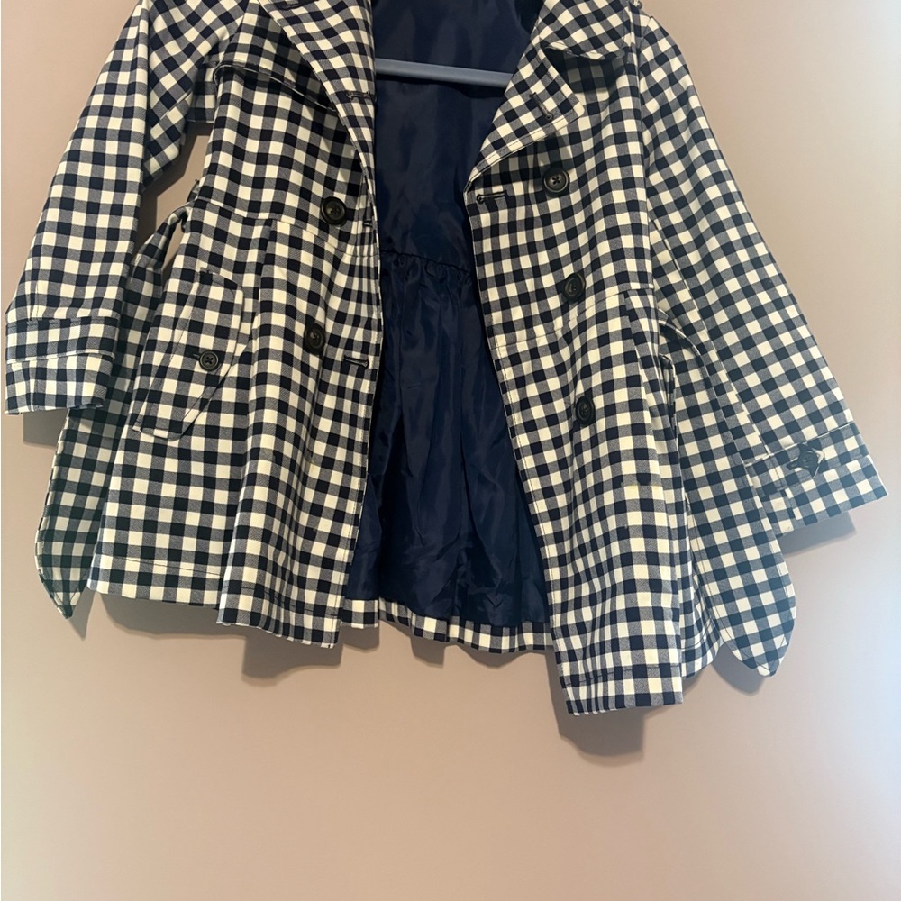 Uniqlo Black and White jacket with a bottom flare